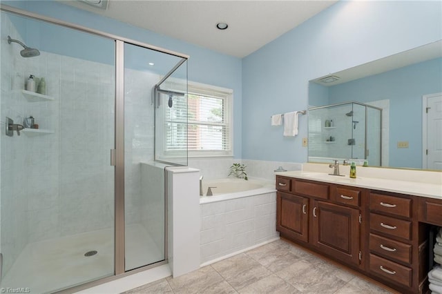 6516 Dornoch Dr, Greensboro, NC 27410 - full bath with a stall shower, a bath, vanity, and tile patterned flooring