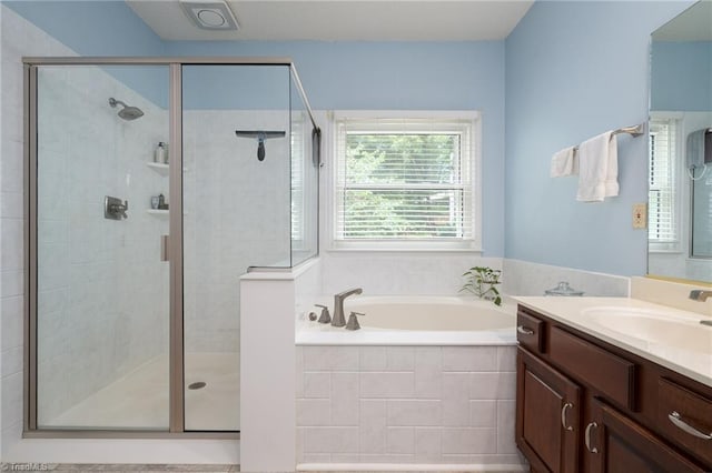6516 Dornoch Dr, Greensboro, NC 27410 - bathroom featuring a shower stall, a bath, and vanity