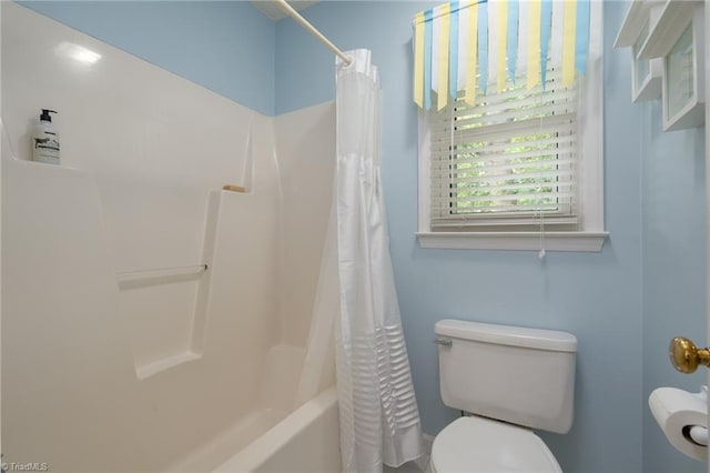 6516 Dornoch Dr, Greensboro, NC 27410 - bathroom featuring toilet and shower / bath combo with shower curtain