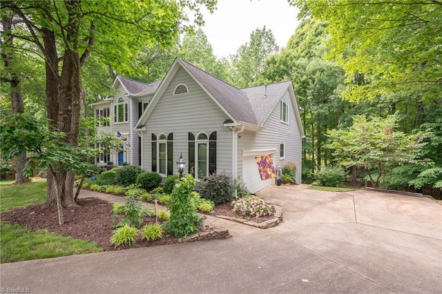 6516 Dornoch Dr, Greensboro, NC 27410 - view of front of house featuring concrete driveway