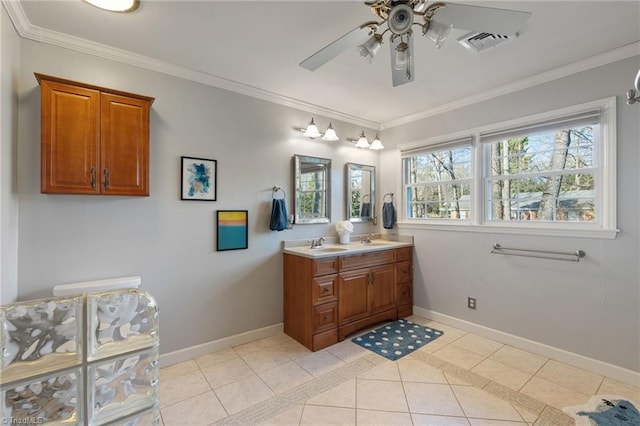 bathroom featuring ceiling fan, ornamental molding, tile patterned flooring, and vanity