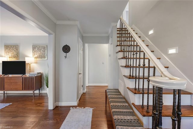 interior space with crown molding and dark hardwood / wood-style floors