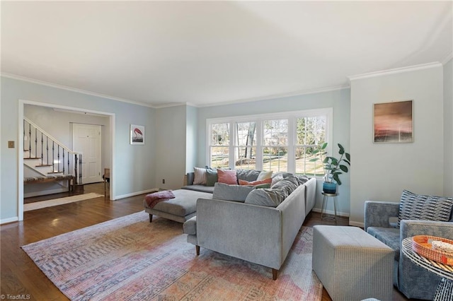 living room with ornamental molding and dark hardwood / wood-style flooring