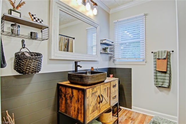 3412 Smithtown Rd, East Bend, NC 27018 - full bathroom with crown molding, vanity, wood finished floors, and baseboards