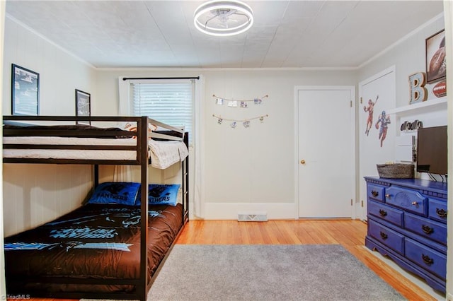3412 Smithtown Rd, East Bend, NC 27018 - bedroom with wood finished floors and ornamental molding