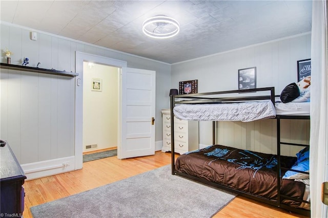 3412 Smithtown Rd, East Bend, NC 27018 - bedroom with wood finished floors, ornamental molding, and baseboards
