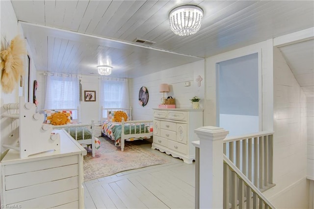 3412 Smithtown Rd, East Bend, NC 27018 - bedroom with a chandelier and wood ceiling