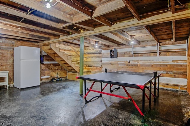 3412 Smithtown Rd, East Bend, NC 27018 - playroom with wood walls and concrete flooring
