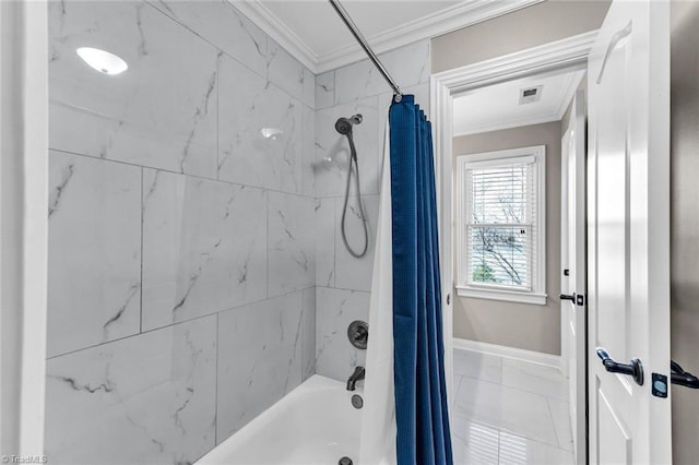 full bathroom with ornamental molding, visible vents, baseboards, and shower / bath combo with shower curtain