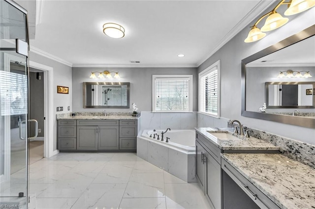 full bath featuring marble finish floor, ornamental molding, and a sink