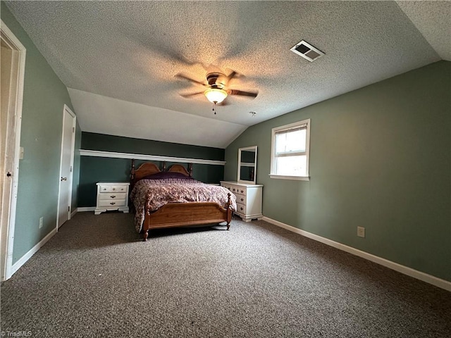 unfurnished bedroom featuring ceiling fan, lofted ceiling, carpet floors, and a textured ceiling