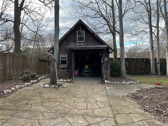 view of outbuilding featuring a garage