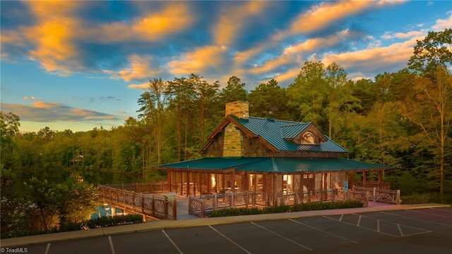 view of outdoor building at dusk