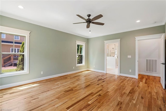 unfurnished bedroom featuring crown molding, ceiling fan, connected bathroom, and light hardwood / wood-style flooring