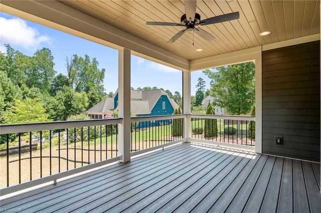 wooden terrace with ceiling fan