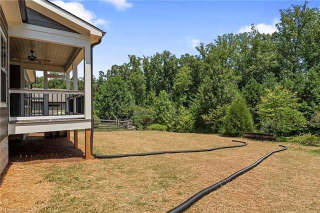 view of yard featuring ceiling fan