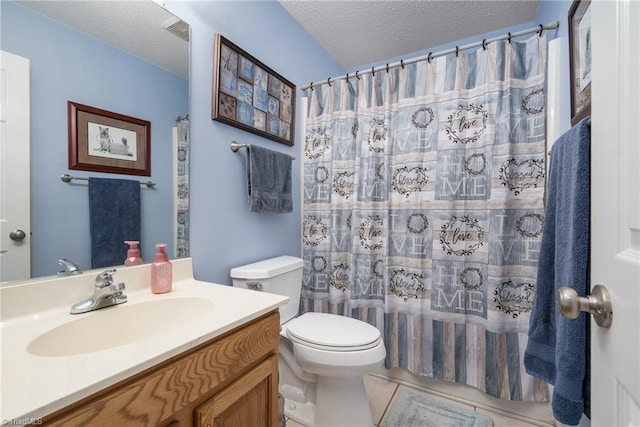 bathroom with tile patterned flooring, toilet, a shower with shower curtain, vanity, and a textured ceiling