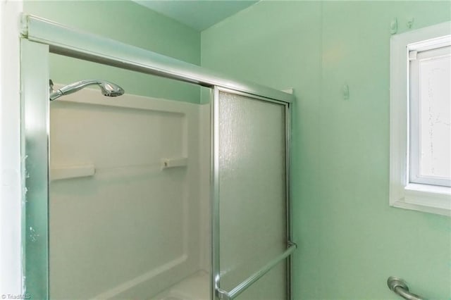 bathroom featuring a stall shower