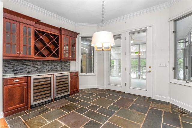 interior space featuring stone tile floors, decorative backsplash, wine cooler, and a bar