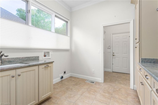 laundry room featuring a sink, visible vents, washer hookup, crown molding, and electric dryer hookup