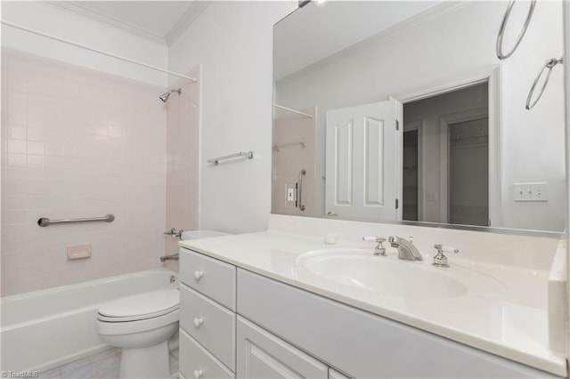 bathroom with toilet, tile patterned flooring, crown molding, vanity, and tub / shower combination