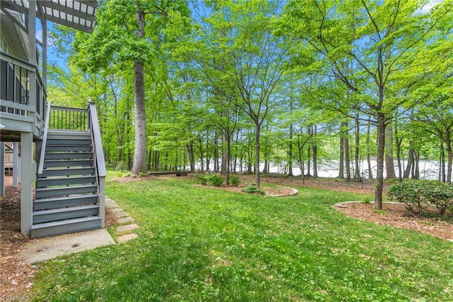 view of yard featuring stairway