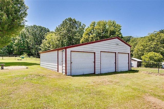 garage with a yard