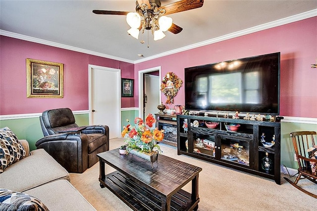 living room featuring ornamental molding, light colored carpet, and ceiling fan