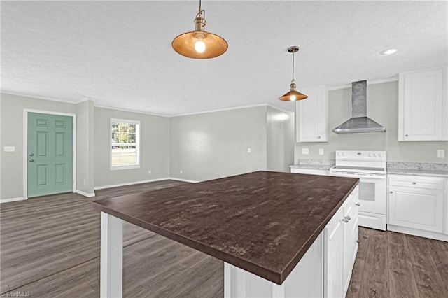 kitchen with white cabinets, wall chimney range hood, dark hardwood / wood-style floors, a center island, and white electric stove