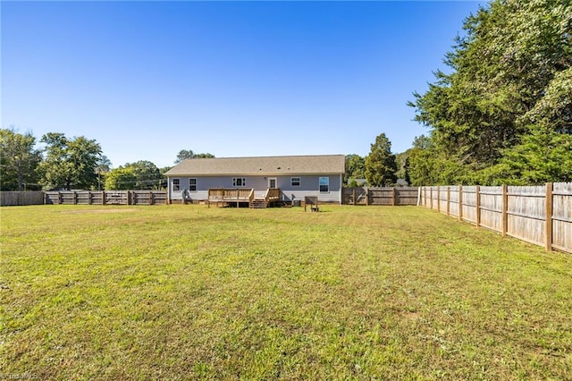 view of yard featuring a wooden deck