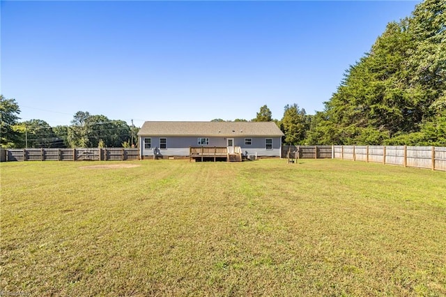 view of yard featuring a wooden deck