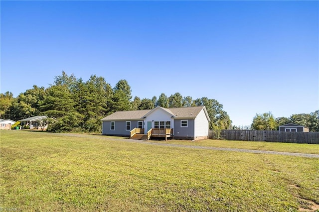 view of front of home with a front yard