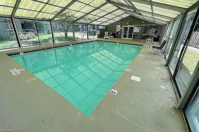 view of pool featuring a lanai