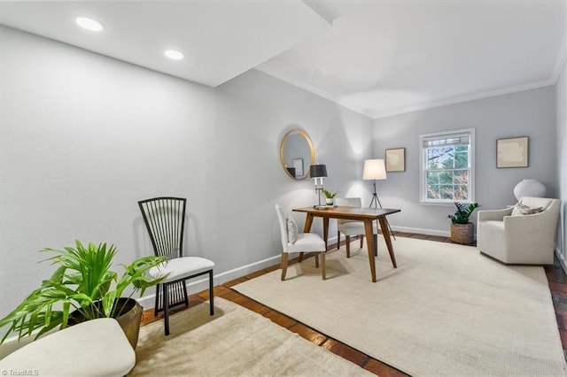 office featuring ornamental molding and light wood-type flooring