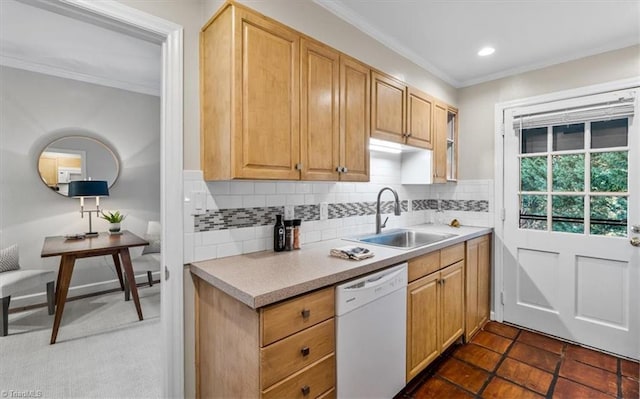 kitchen with sink, backsplash, crown molding, light brown cabinets, and white appliances