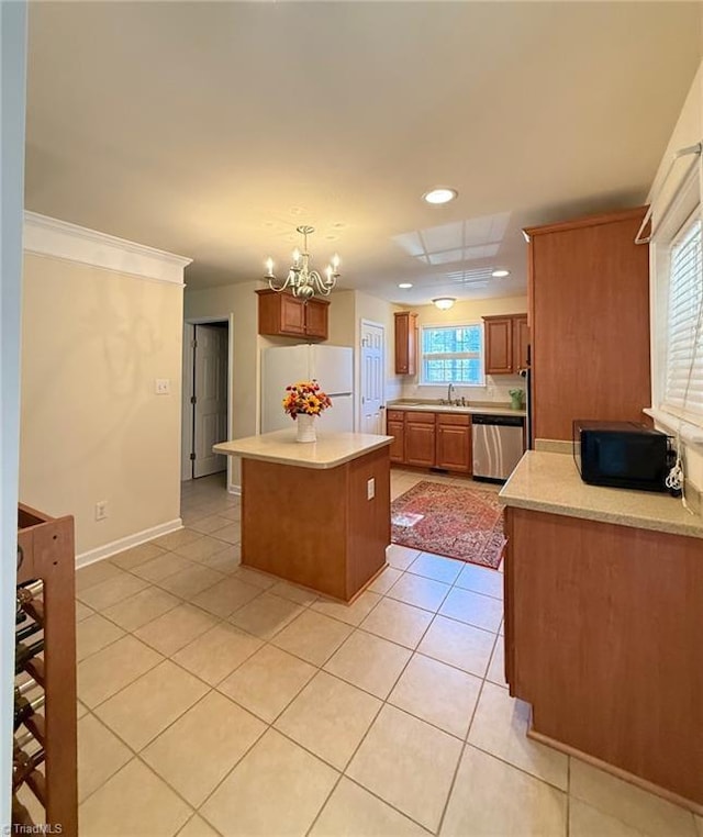 kitchen featuring stainless steel dishwasher, pendant lighting, a kitchen island, white refrigerator, and light tile patterned flooring