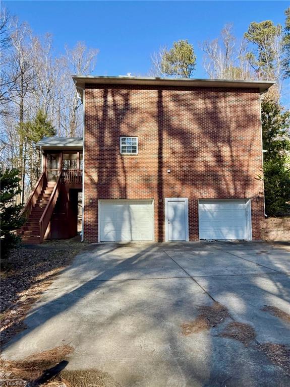 view of home's exterior with a garage