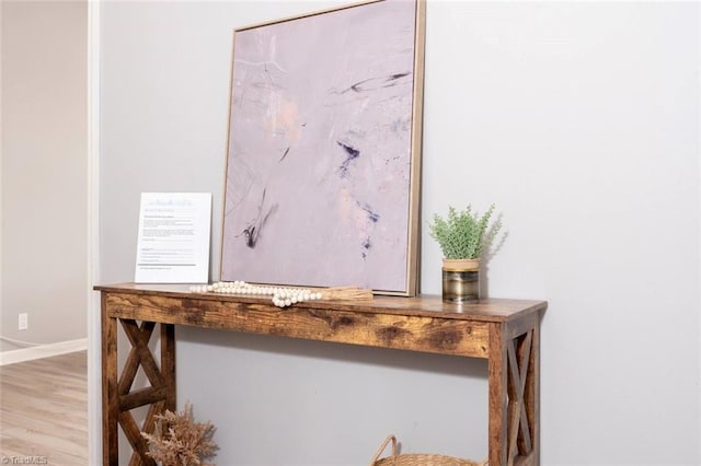 detailed view of wood finished floors and baseboards