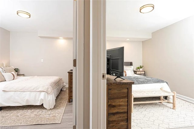 bedroom featuring wood finished floors