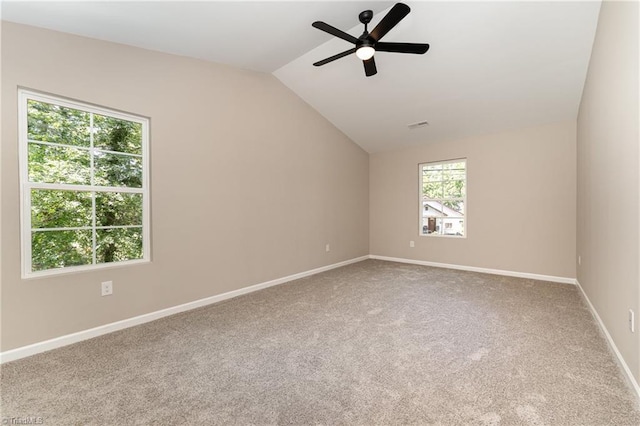 512 Guilford Ave, High Point, NC 27262 - carpeted spare room featuring lofted ceiling, a ceiling fan, and baseboards