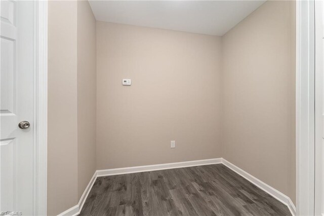 512 Guilford Ave, High Point, NC 27262 - spare room featuring dark wood-style floors and baseboards