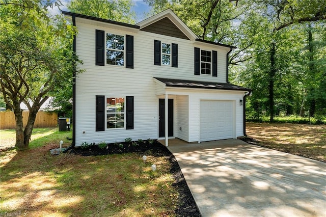 512 Guilford Ave, High Point, NC 27262 - view of front facade featuring central AC, an attached garage, and concrete driveway