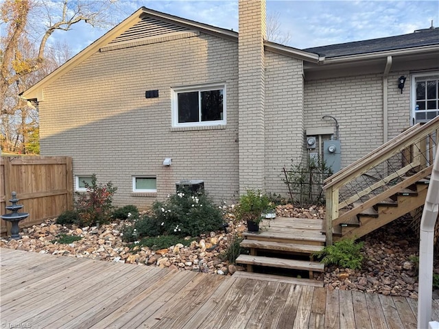 back of house featuring a deck