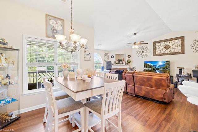6112 Hedgecock Cir Unit 3B, High Point, NC 27265 - dining room with wood finished floors, ceiling fan, a chandelier, and vaulted ceiling