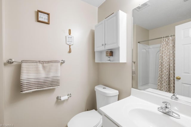 6112 Hedgecock Cir Unit 3B, High Point, NC 27265 - bathroom with toilet, vanity, and a shower with curtain