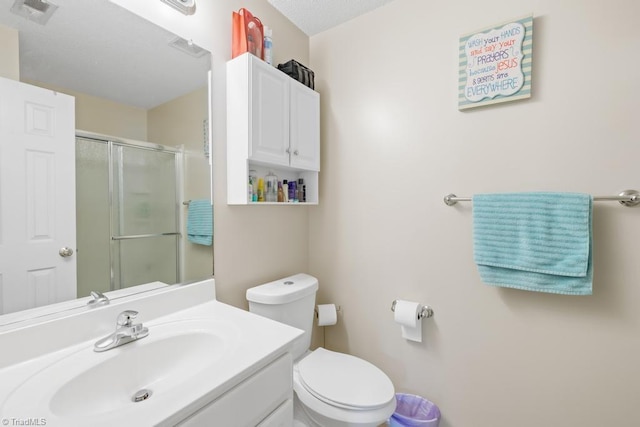 6112 Hedgecock Cir Unit 3B, High Point, NC 27265 - bathroom with a shower with door, vanity, and toilet