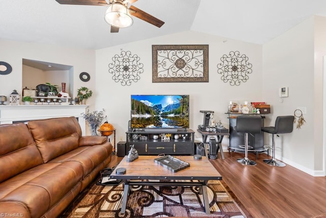 6112 Hedgecock Cir Unit 3B, High Point, NC 27265 - living area featuring ceiling fan, vaulted ceiling, wood finished floors, and baseboards