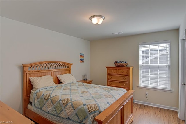 4548 River Gate Dr, Clemmons, NC 27012 - bedroom with light wood-type flooring and baseboards