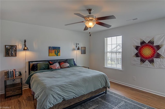 4548 River Gate Dr, Clemmons, NC 27012 - bedroom featuring wood finished floors, baseboards, and ceiling fan