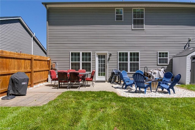4548 River Gate Dr, Clemmons, NC 27012 - back of house with a patio and an outdoor fire pit
